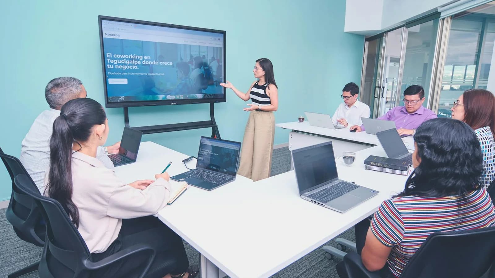 Hybrid office collaboration zone demonstrating space value through real use