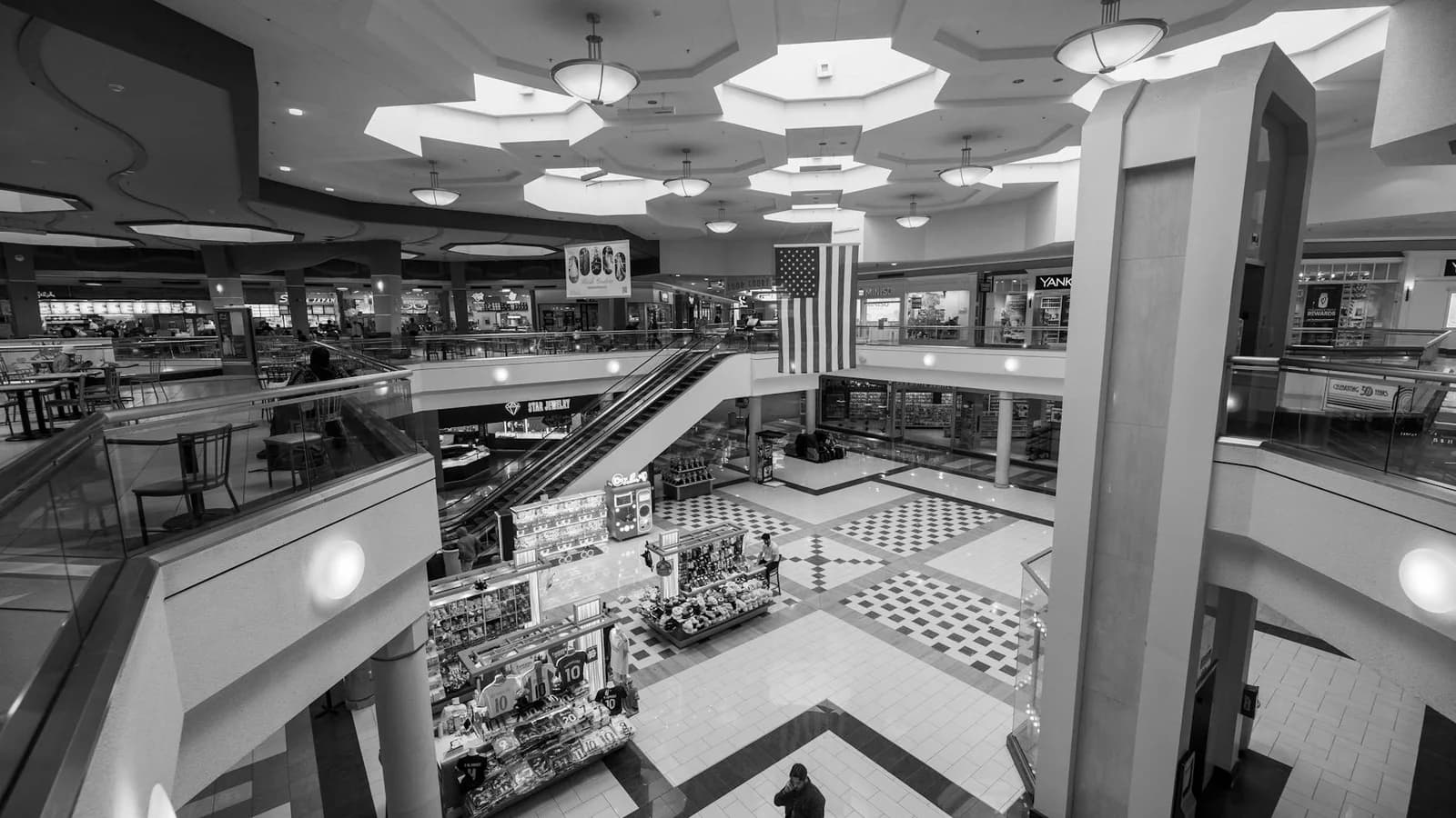 Shopping mall arrival journey from parking into interior entry zones